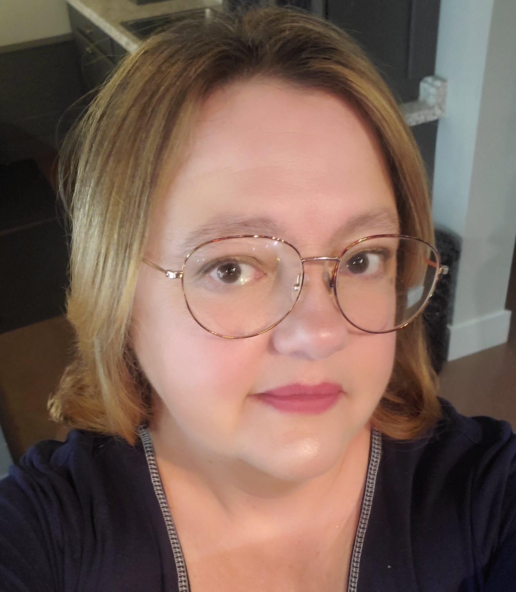 A woman with glasses